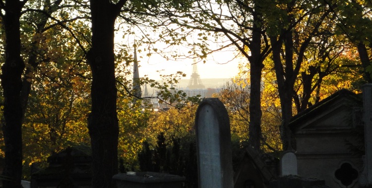 View of the Eiffel Tower from Chemin Laplace at Père Lachaise Cemetery.